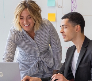 Faculty member assisting a student